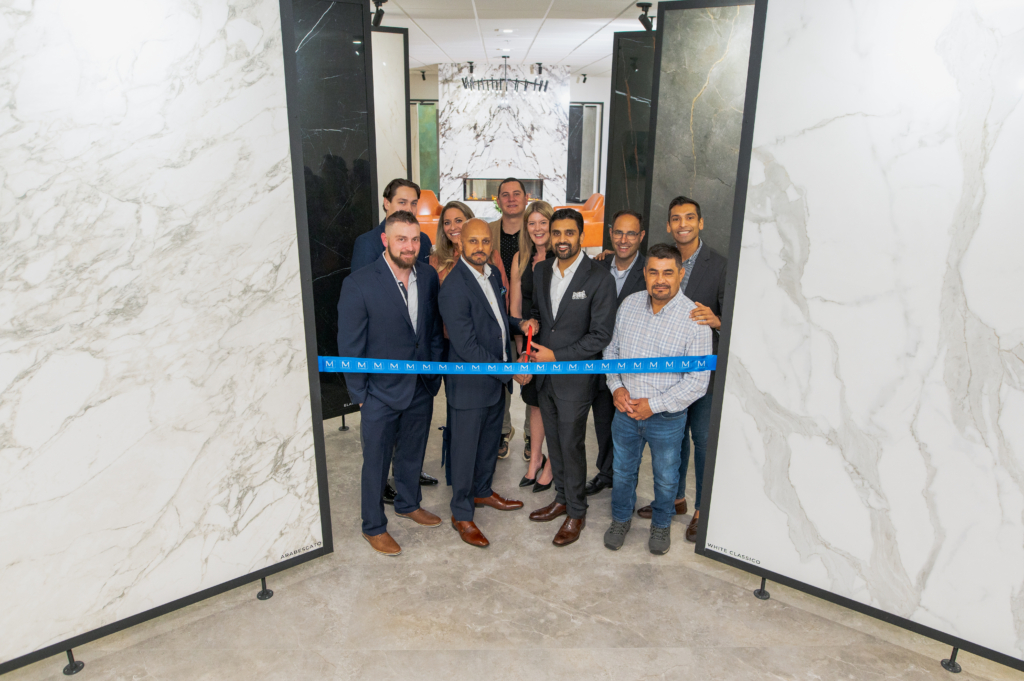 Charlotte Moderno Porcelain Works grand opening, team cutting ribbon
